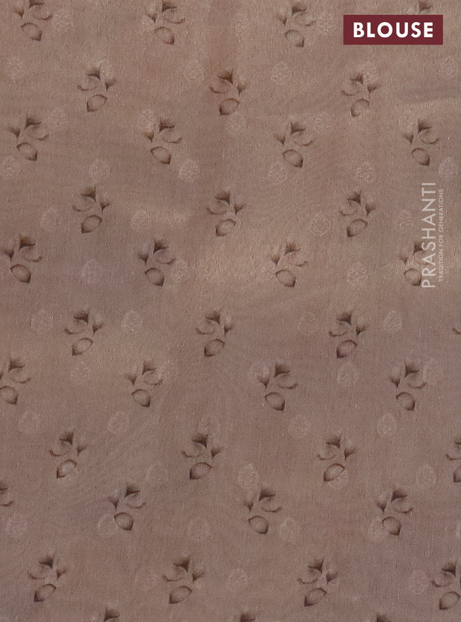 Tissue saree mild peach with allover zari weaves and floral digital printed border