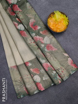 Tissue saree pastel pista green and green with allover zari weaves and floral digital printed border