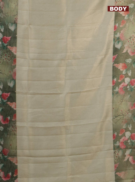 Tissue saree pastel pista green and green with allover zari weaves and floral digital printed border