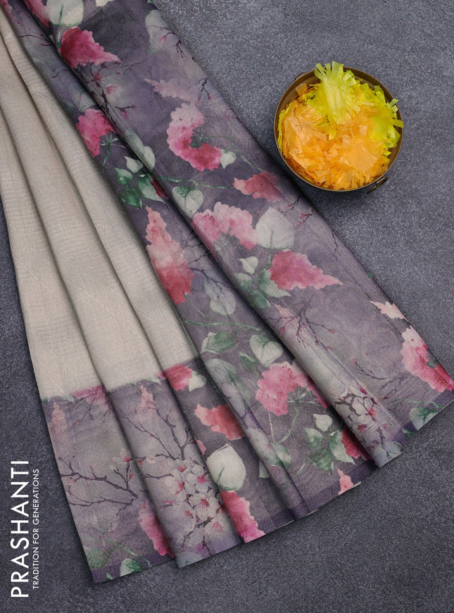 Tissue saree cream and violet with allover zari weaves and floral digital printed border