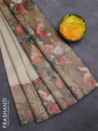 Tissue saree cream and sandal with allover zari weaves and floral digital printed border