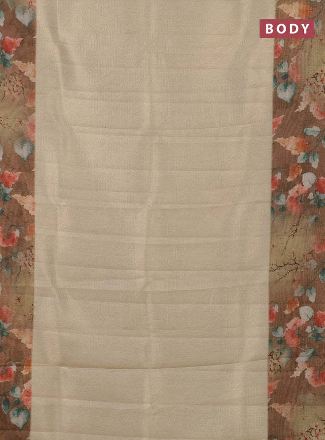 Tissue saree cream and sandal with allover zari weaves and floral digital printed border