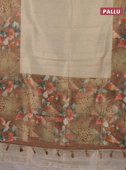 Tissue saree cream and sandal with allover zari weaves and floral digital printed border