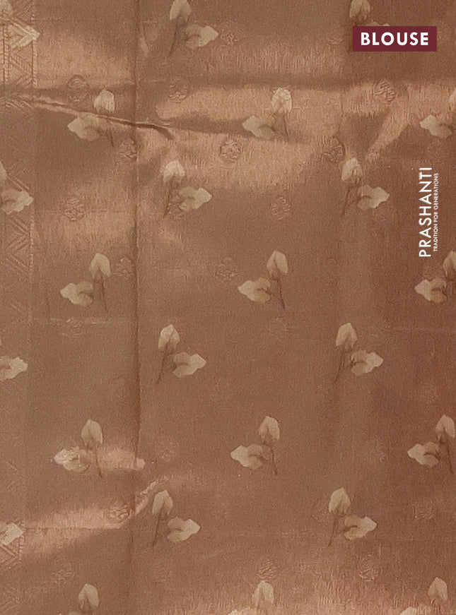 Tissue saree cream and sandal with allover zari weaves and floral digital printed border