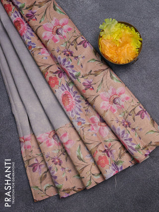 Tissue saree grey and peach orange with allover zari weaves and floral digital printed border