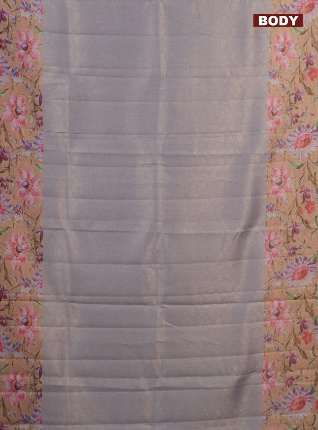 Tissue saree grey and peach orange with allover zari weaves and floral digital printed border