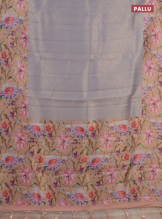 Tissue saree grey and peach orange with allover zari weaves and floral digital printed border