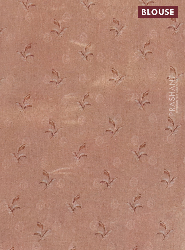 Tissue saree grey and peach orange with allover zari weaves and floral digital printed border