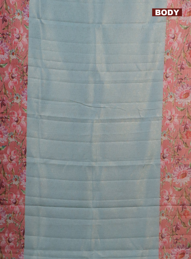 Tissue saree light blue and peach pink with allover zari weaves and floral digital printed border