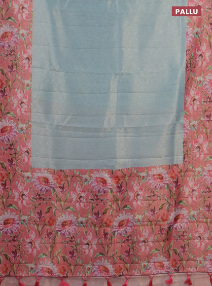 Tissue saree light blue and peach pink with allover zari weaves and floral digital printed border