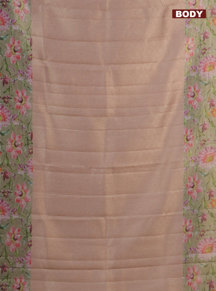 Tissue saree pastel peach and green with allover zari weaves and floral digital printed border