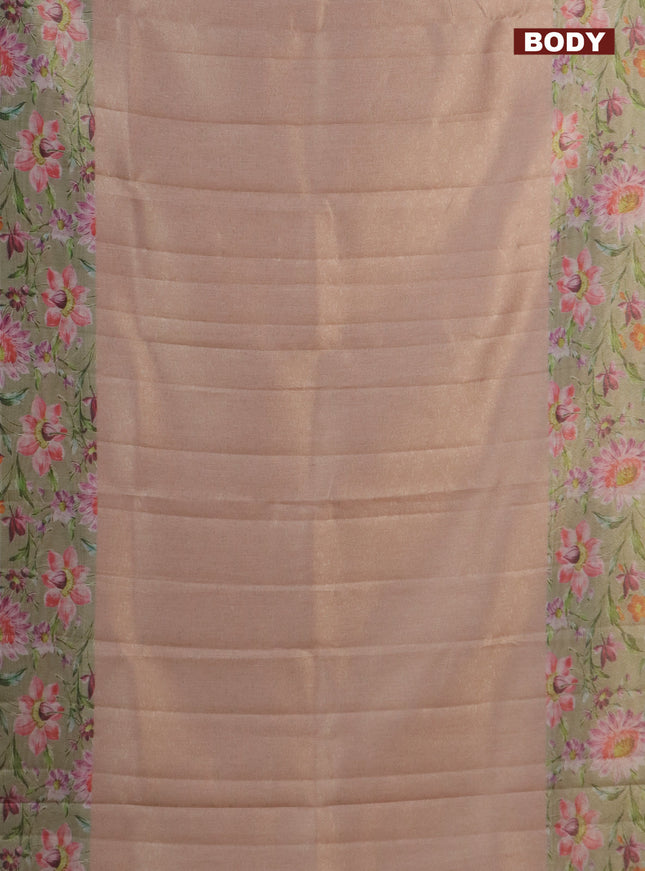 Tissue saree pastel peach and green with allover zari weaves and floral digital printed border
