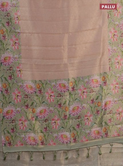 Tissue saree pastel peach and green with allover zari weaves and floral digital printed border
