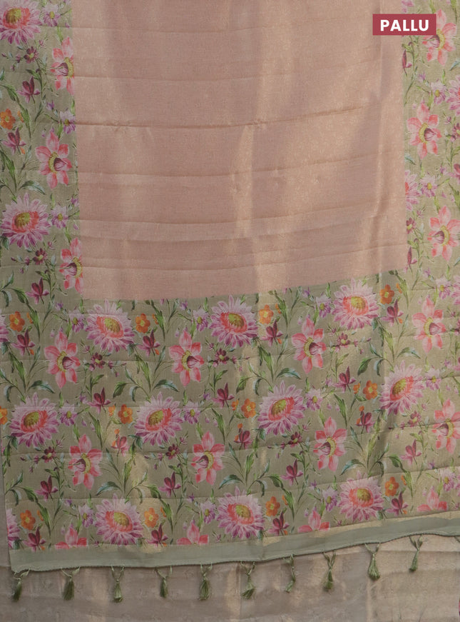 Tissue saree pastel peach and green with allover zari weaves and floral digital printed border