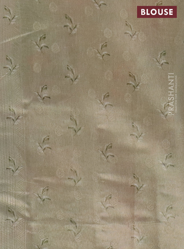 Tissue saree pastel peach and green with allover zari weaves and floral digital printed border