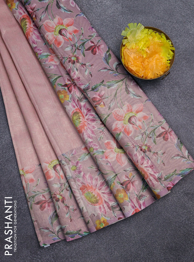 Tissue saree peach pink with allover zari weaves and floral digital printed border
