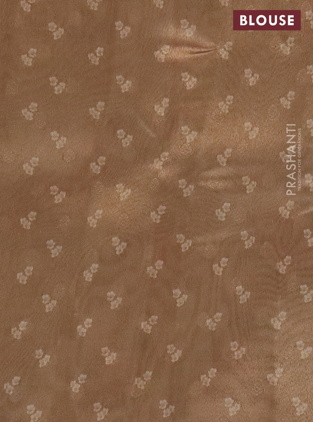 Tissue saree sandal with allover zari weaves and floral digital printed border