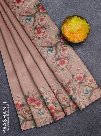 Tissue saree mild peach with allover zari weaves and floral digital printed border