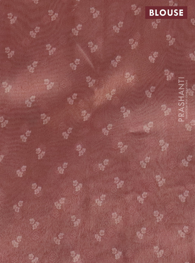 Tissue saree mild peach with allover zari weaves and floral digital printed border