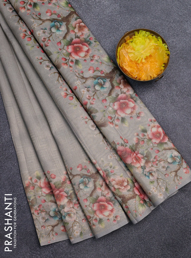 Tissue saree pastel grey with allover zari weaves and floral digital printed border