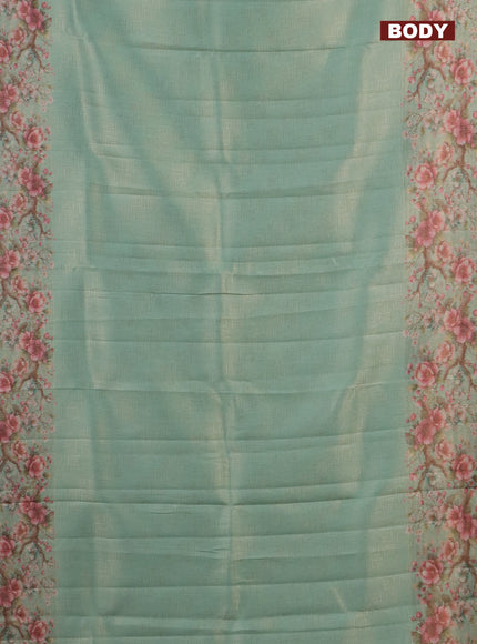 Tissue saree teal green shade with allover zari weaves and floral digital printed border