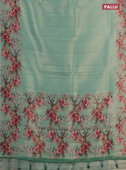 Tissue saree teal green shade with allover zari weaves and floral digital printed border