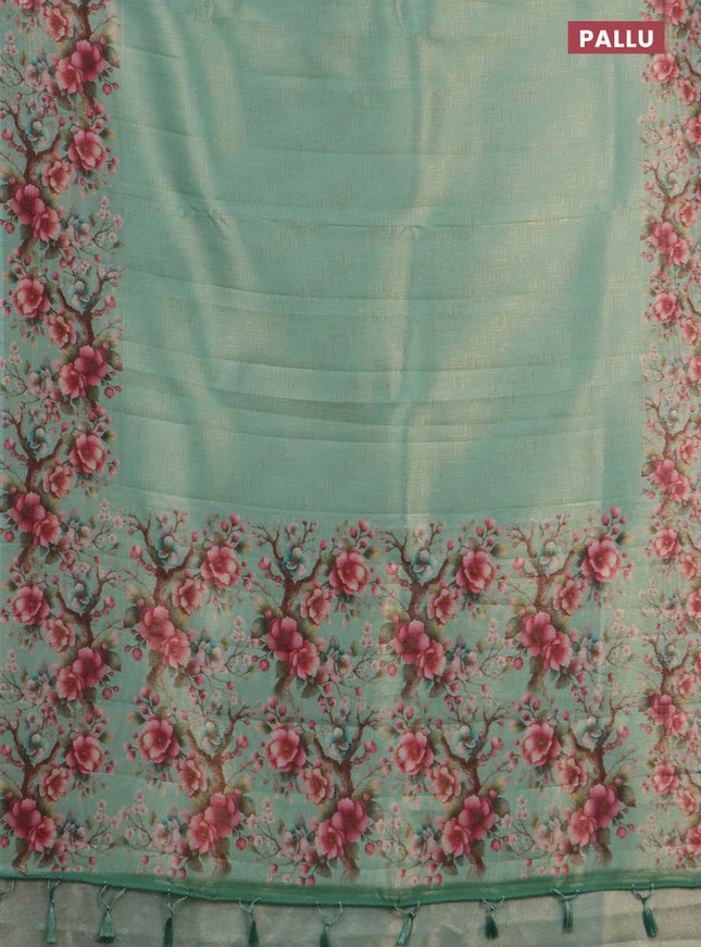 Tissue saree teal green shade with allover zari weaves and floral digital printed border