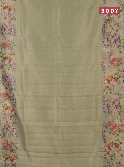 Tissue saree pista green with allover zari weaves and floral digital printed border