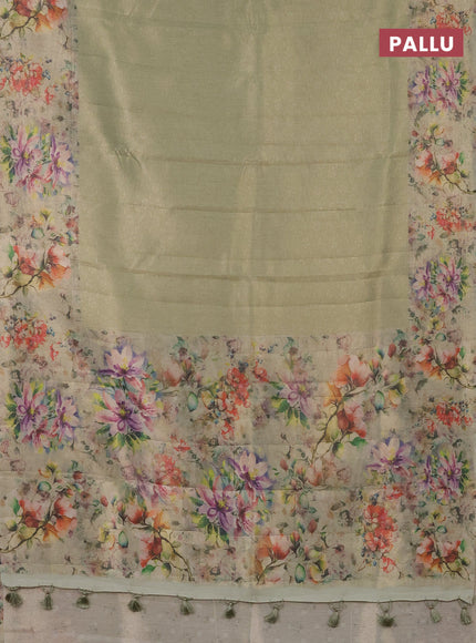 Tissue saree pista green with allover zari weaves and floral digital printed border
