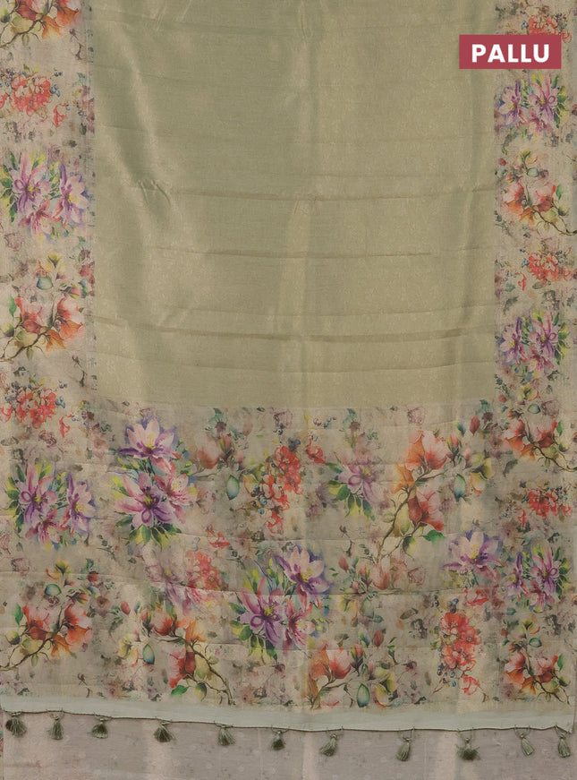 Tissue saree pista green with allover zari weaves and floral digital printed border