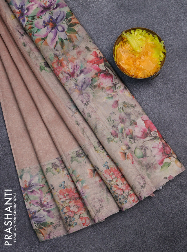 Tissue saree peach orange with allover zari weaves and floral digital printed border