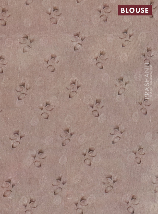 Tissue saree peach orange with allover zari weaves and floral digital printed border