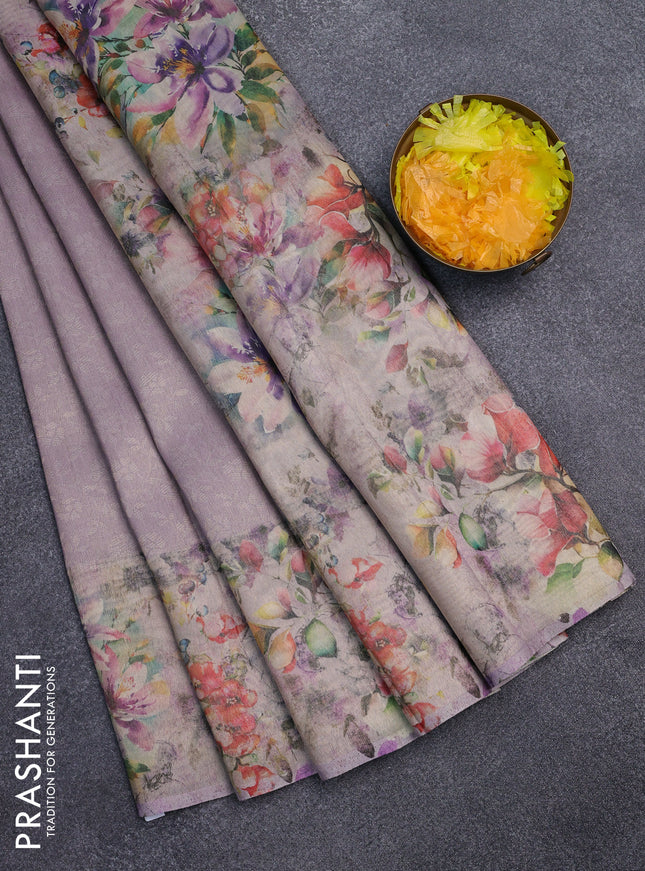 Tissue saree mild lavender with allover zari weaves and floral digital printed border