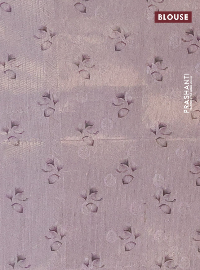 Tissue saree mild lavender with allover zari weaves and floral digital printed border