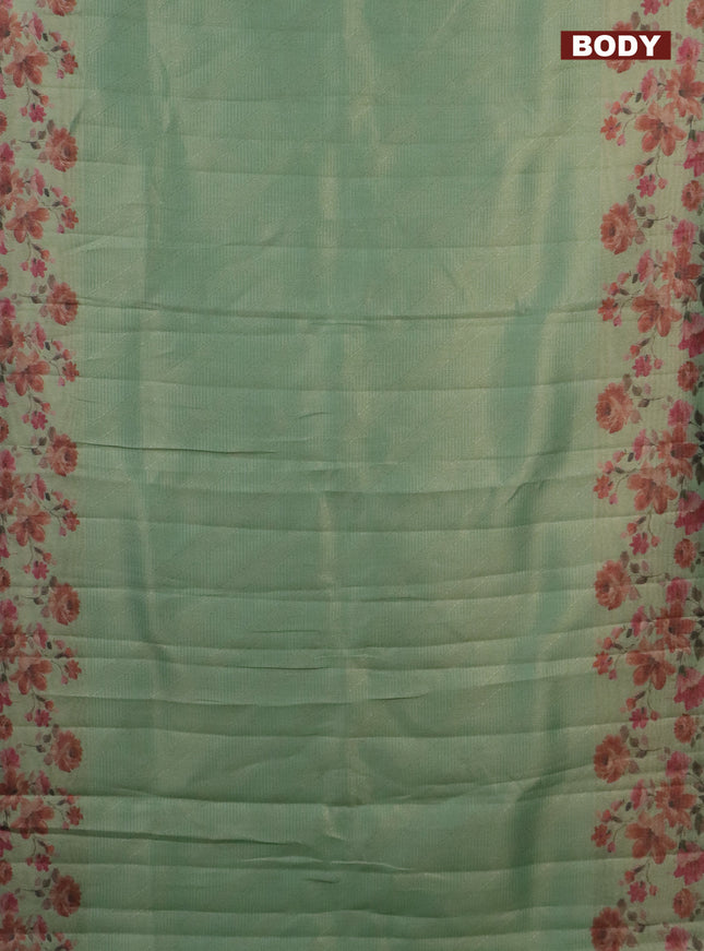 Tissue saree pastel green with allover zari weaves and floral digital printed border