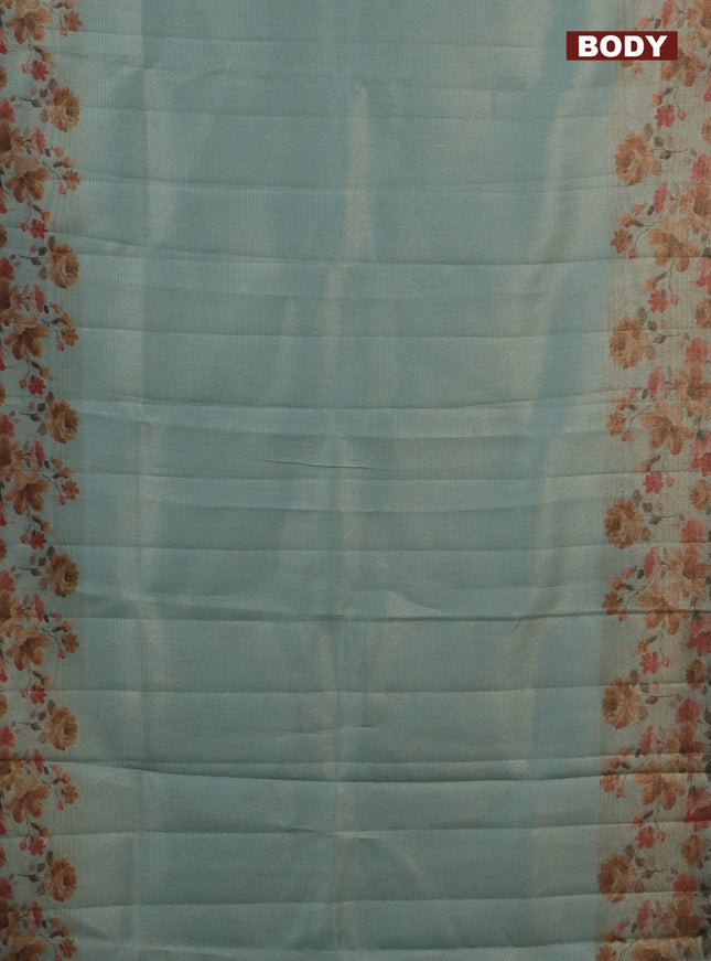 Tissue saree pastel blue with allover zari weaves and floral digital printed border
