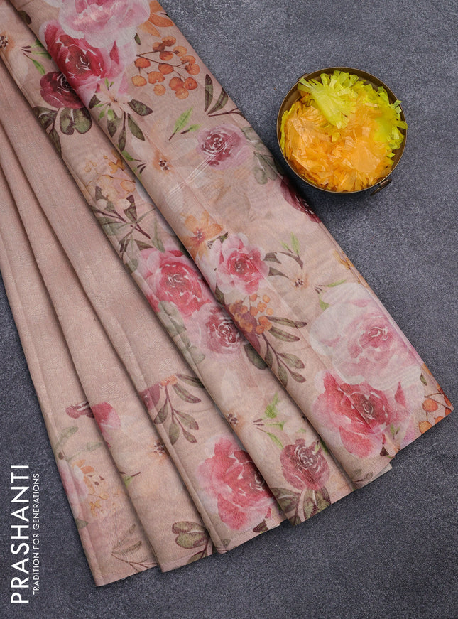 Tissue saree pastel peach orange with allover zari weaves and floral digital printed border