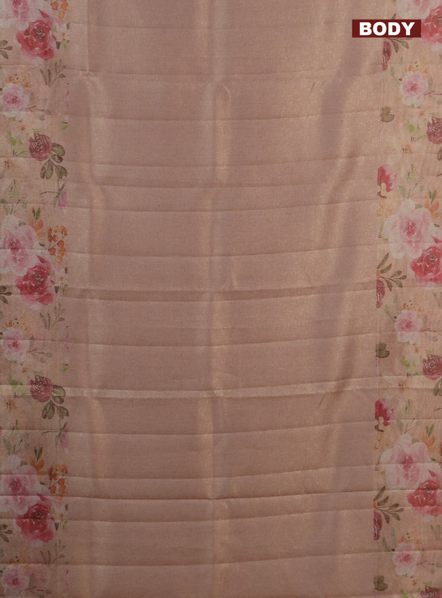 Tissue saree pastel peach orange with allover zari weaves and floral digital printed border