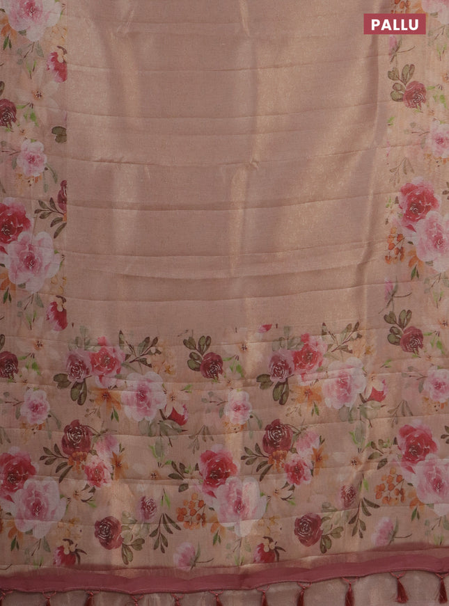 Tissue saree pastel peach orange with allover zari weaves and floral digital printed border