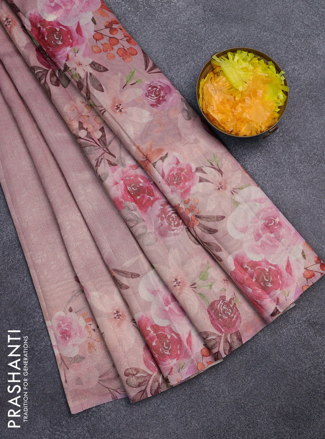Tissue saree light pink with allover zari weaves and floral digital printed border
