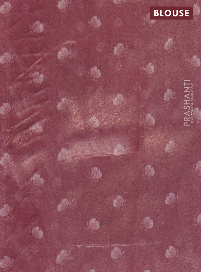 Tissue saree light pink with allover zari weaves and floral digital printed border