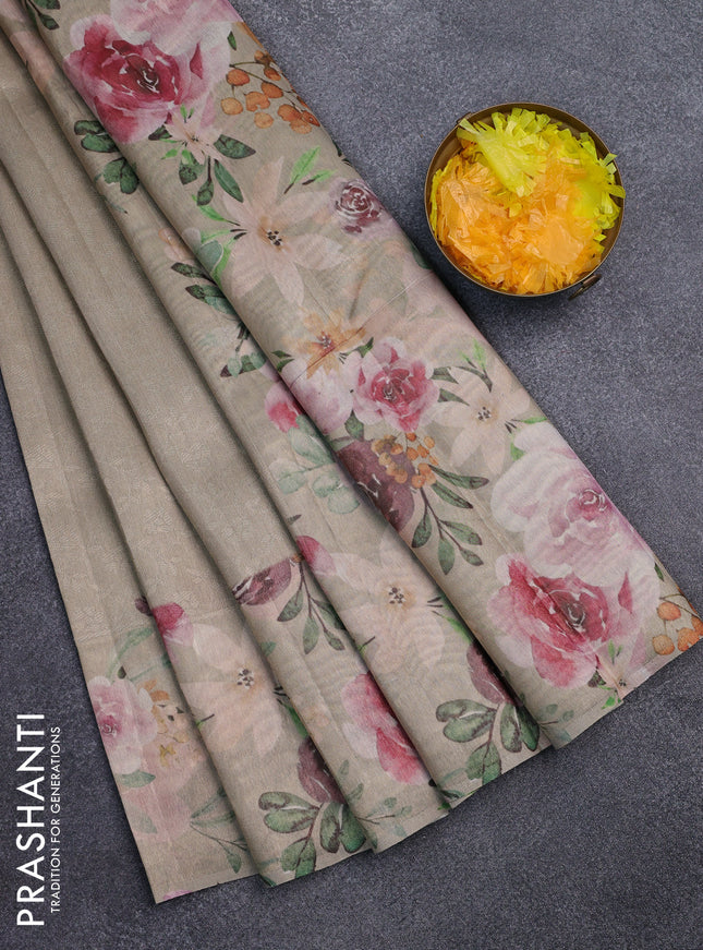 Tissue saree beige with allover zari weaves and floral digital printed border