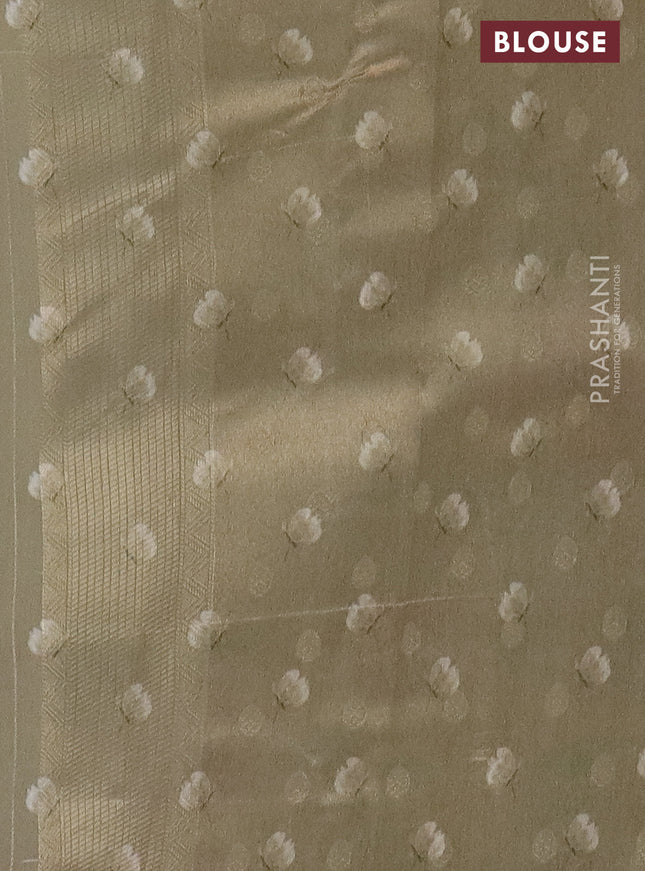 Tissue saree beige with allover zari weaves and floral digital printed border