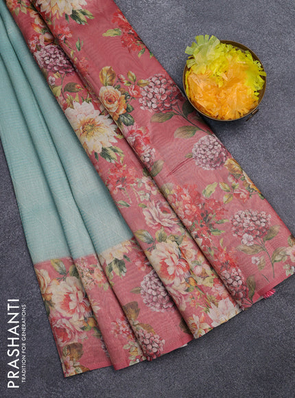 Tissue saree pastel blue and peach pink with allover zari weaves and floral digital printed border