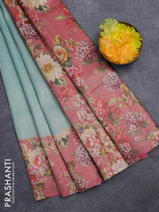 Tissue saree pastel blue and peach pink with allover zari weaves and floral digital printed border