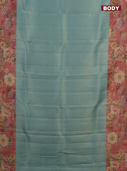 Tissue saree pastel blue and peach pink with allover zari weaves and floral digital printed border