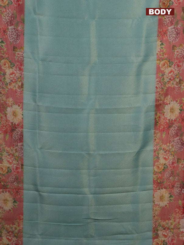 Tissue saree pastel blue and peach pink with allover zari weaves and floral digital printed border