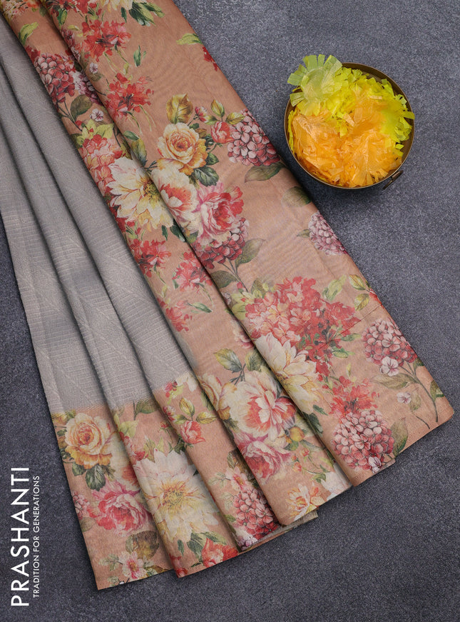Tissue saree pastel grey and peach shade with allover zari weaves and floral digital printed border