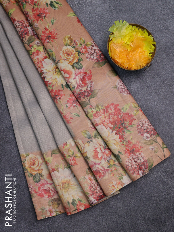 Tissue saree pastel grey and peach shade with allover zari weaves and floral digital printed border