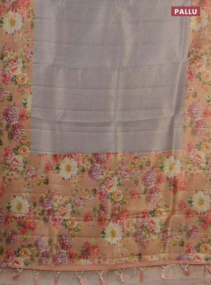 Tissue saree pastel grey and peach shade with allover zari weaves and floral digital printed border